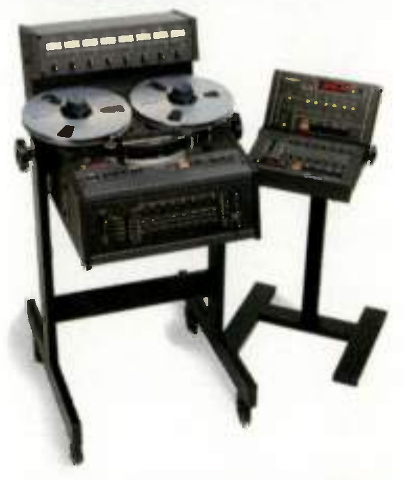 The MARK III/8 on a black floor stand: the meter bridge with eight meters across the back, two reels on the transport, the channel electronics on the sloping front panel, and beside it the remote unit on its own pedestal stand.