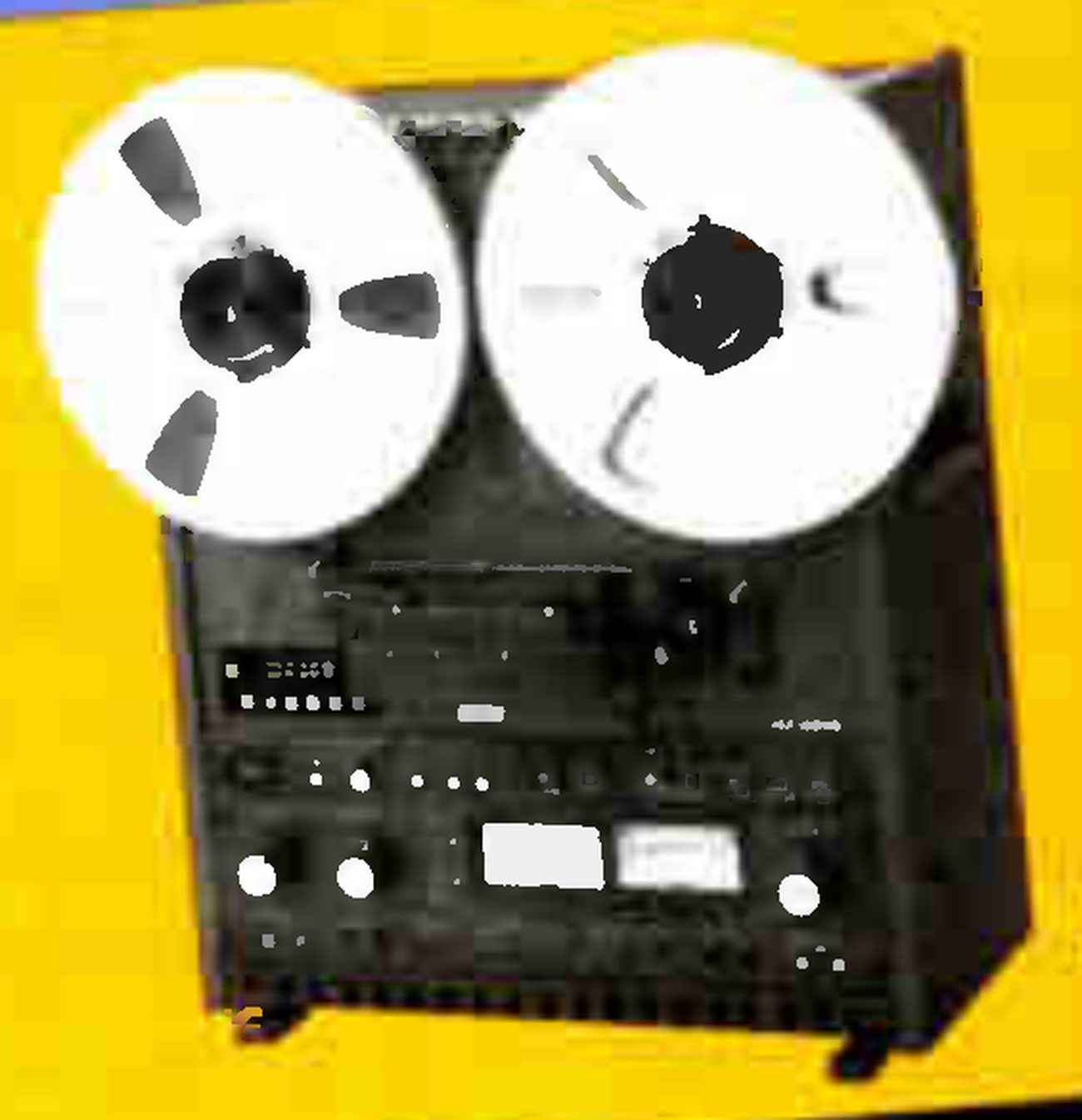 The MX5050 BIII photographed from the front on a yellow panel: two reels on top, and below them the dark front of the machine with the counter display at left, rows of small switches, two meters between level knobs, and the cabinet standing on two feet.