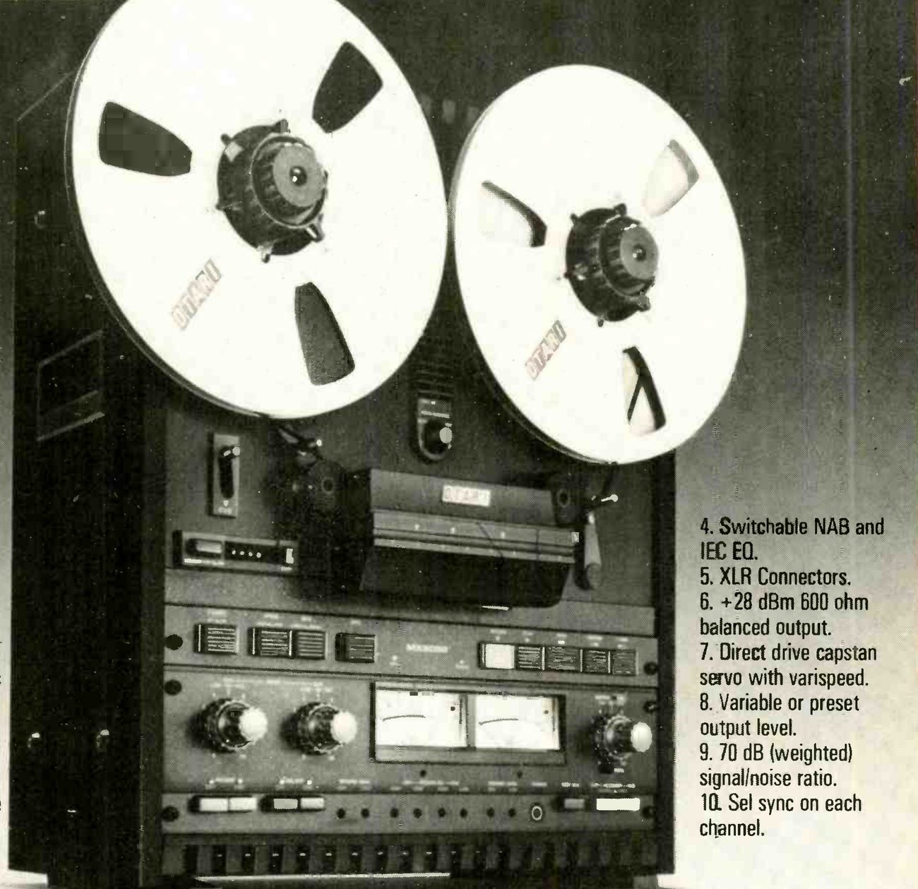 The MX5050B from a three-quarter angle against a dark ground, with large OTARI reels on both hubs, the OTARI badge on the head cover, the transport push buttons, and the input and output level knobs either side of the two VU meters; points 4 to 10 of the feature list are printed over the dark ground to the right.