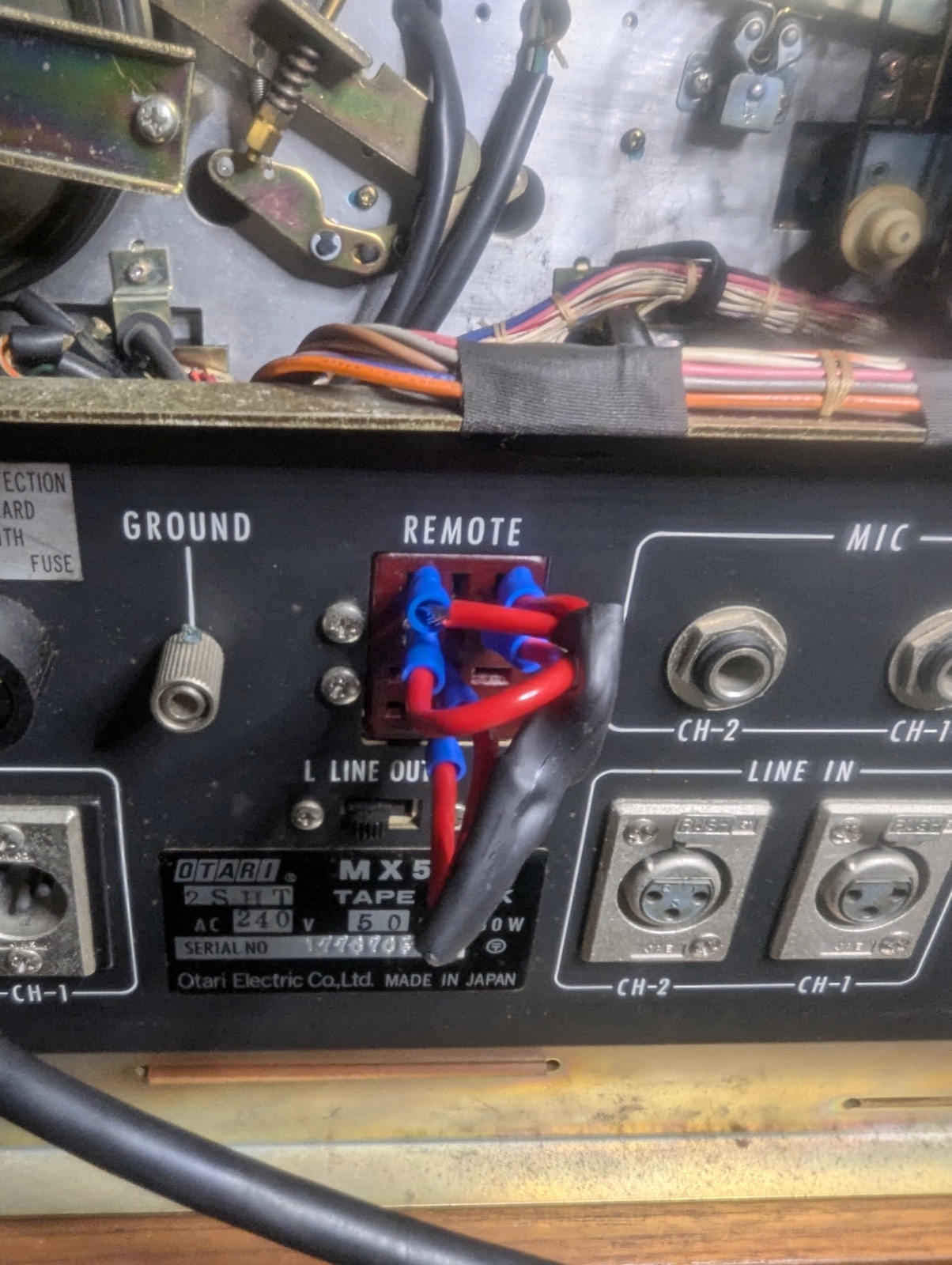 The Frankenstein dummy plug — automotive crimp ends in the remote jack.