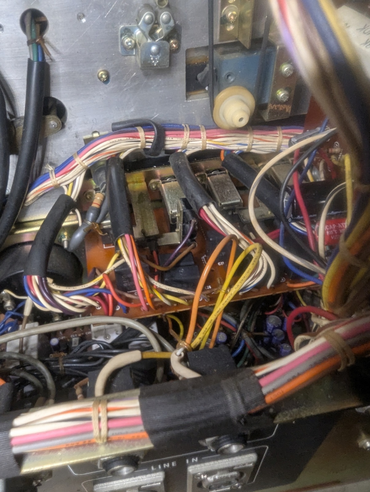 The switch board back in, with black X2-rated spark quenchers where the white 1977 blocks used to be.