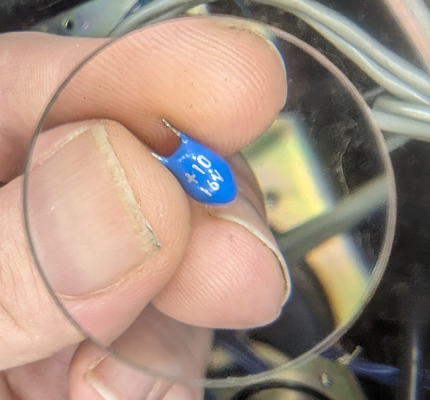 C51, the replay-head tantalum, minutes after desoldering — the first one out.