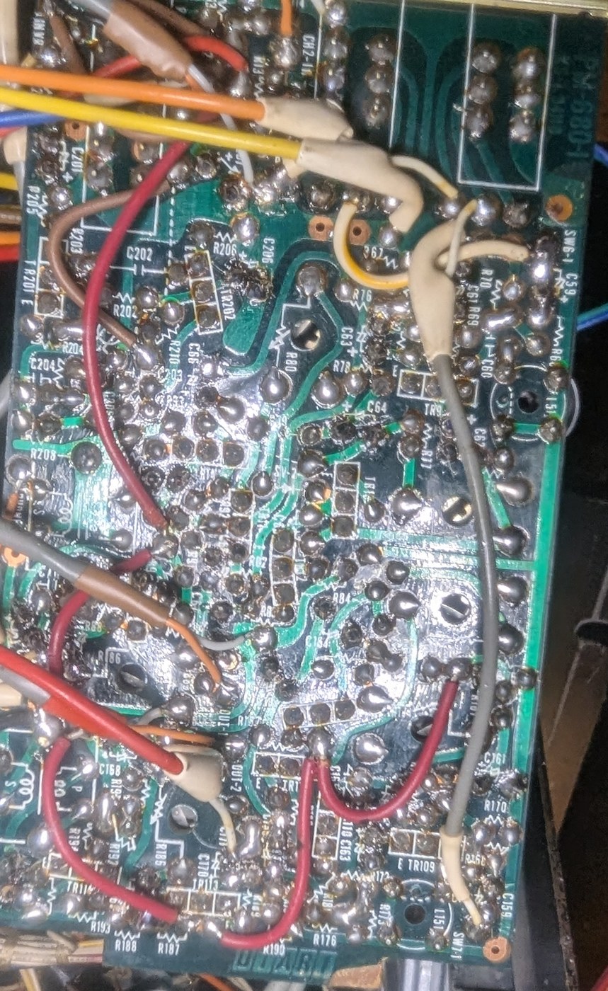 PM-680-1 — the line-out board from the solder side, fresh joints across the audio path.