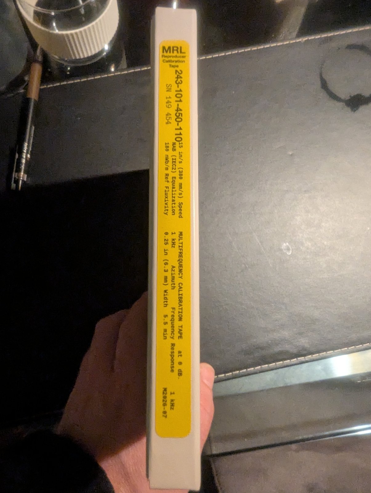 The MRL multifrequency calibration tape, sealed on its reel — 180 nWb/m at 15 in/s, the manual's own reference level.